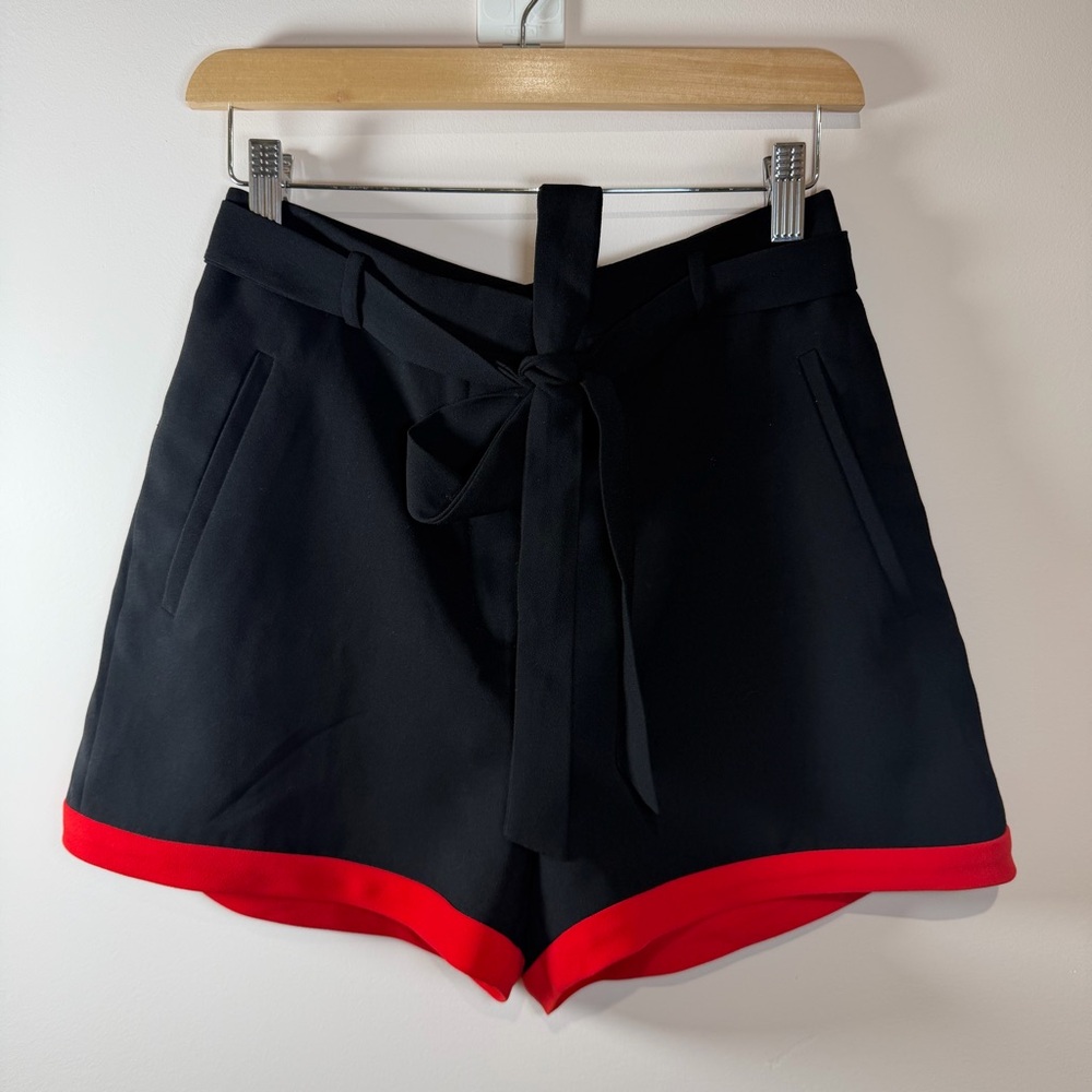 Aritzia Little Moon Black High-Waist Shorts with Red Hem and Belt